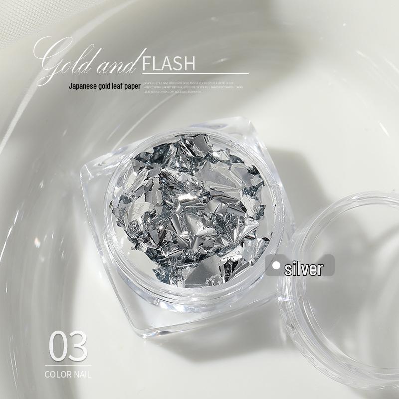 

Японські високоглянсові золоті та срібні фольговані фрагменти для нейл-арту - 9 ультратонких кольорів