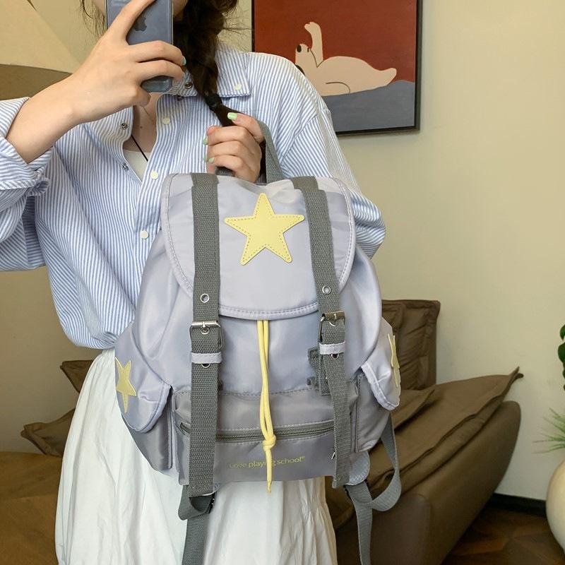 Schultasche neues koreanisches Nischen-Design Sternen-Rucksack Damen leichter Reise-Rucksack kleiner Studenten-Freizeit-Rucksack