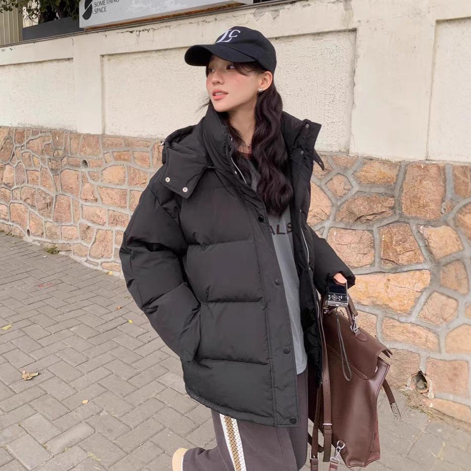 In the winter of 2008, the new white duck down jacket women's thickened niche design sense fashionable warm jacket