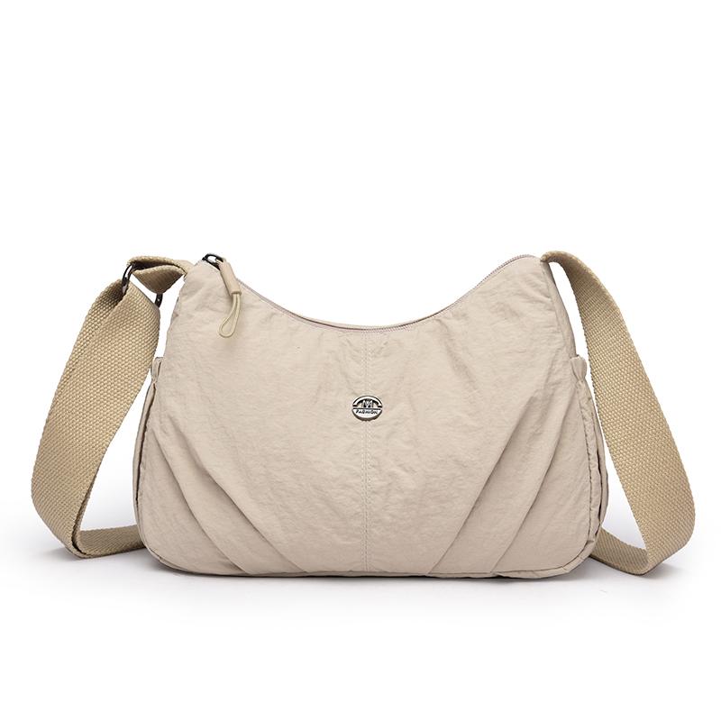 

Легкая нейлоновая сумка женская на плечо кроссбоди однотонная сумка для мамы бежевый