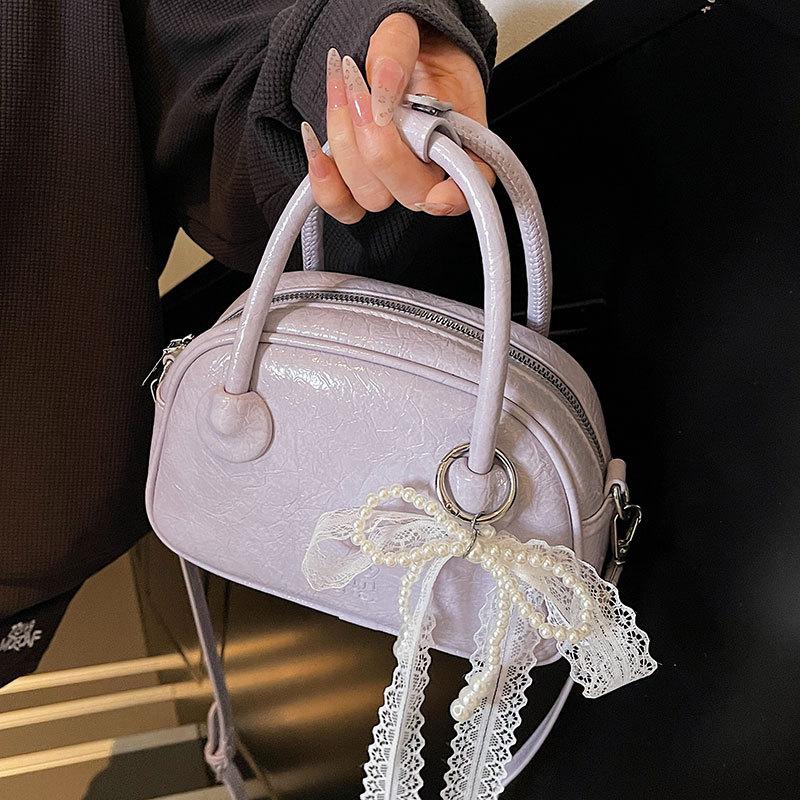 New product simple, fashionable and high-quality portable pillow bag women's spring and summer new product foreign style versatile casual messenger ba