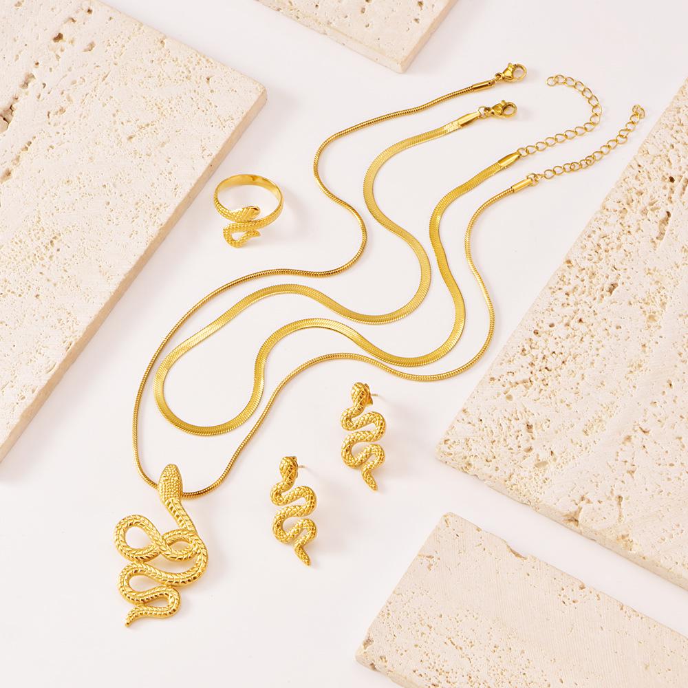 Stainless Steel Snake Jewelry Set: Retro-Style Necklace, Earrings, and Ring.