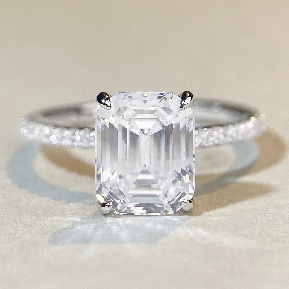 Aquamarine Emerald-Cut Ring In 925 Sterling Silver with Pave Diamonds, Plated In PT950 Gold.