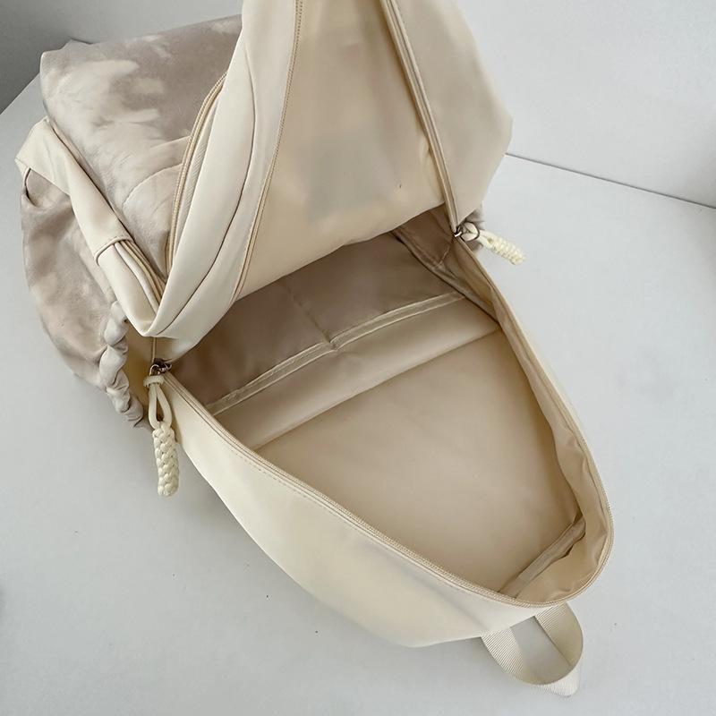 School bag 2025 new tie-dye backpack Korean version fashionable and cute large-capacity school bag casual simple backpack