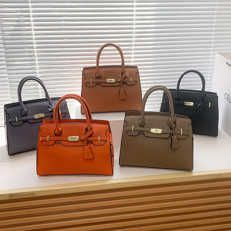 Bag women's early spring new simple solid color shoulder bag fashion temperament lychee pattern handbag