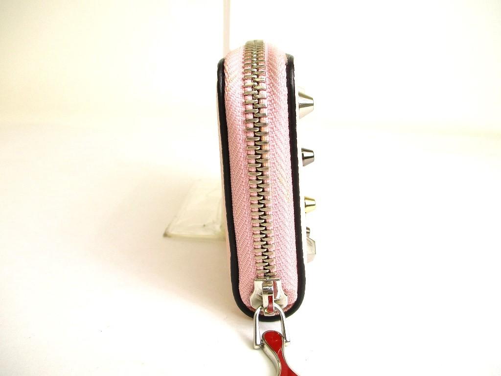 Porte-monnaie rond zippé en cuir rose clair Christian Louboutin authentique #9691 remis à neuf
