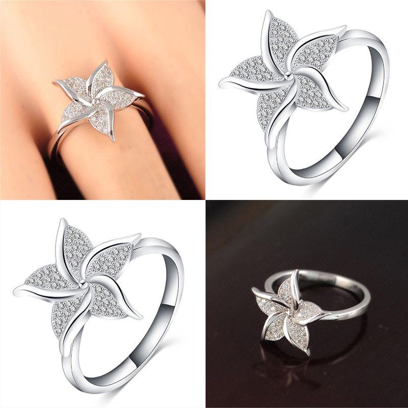 Stunning Fashion Windmill Shape Ring With Silver Plated Flower Design For Women