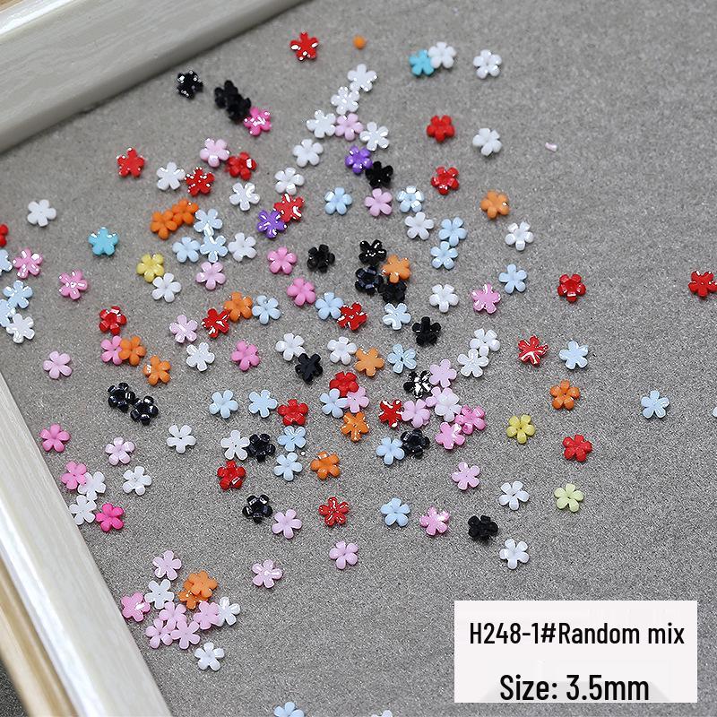 

Xiaohongshu Набор разноцветных аксессуаров для нейл-арта в виде пятилепестковых цветов 3 мм - 100 шт.