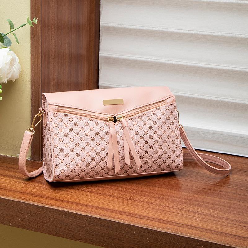 Women's bag, new women's change bag, niche bag, messenger bag, printed shoulder bag, one piece.
