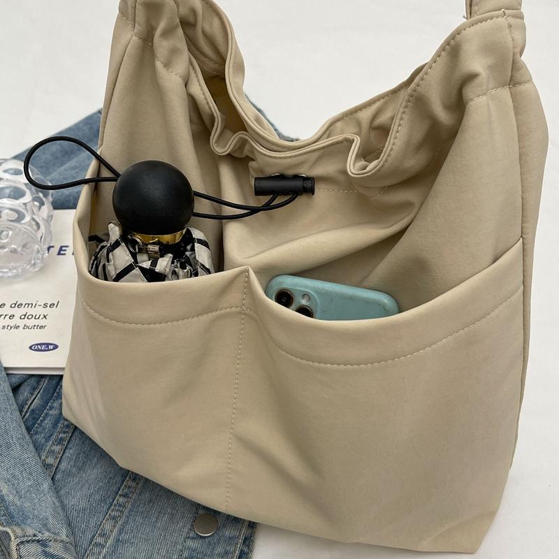 Женская однотонная сумка на плечо большой емкости — фото 9