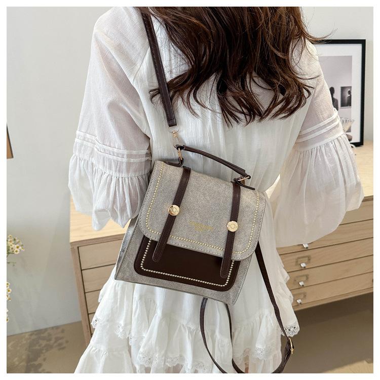 

Travel small schoolbag 2025 new foreign style versatile student travel super hot backpack fashion contrasting color women s backpack хакі