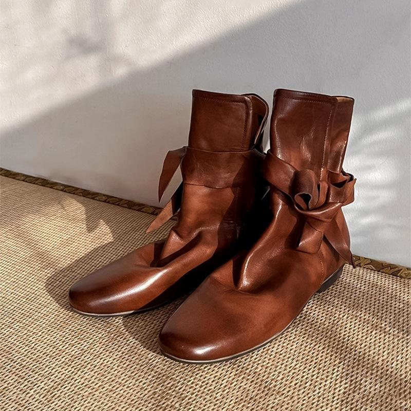 Leather niche polished Martin boots women's autumn and winter Chelsea short boots bow flat-bottomed pleated stacked boots