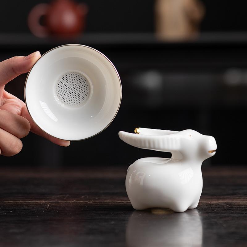 Talgjade Teeleck Weißporzellan Haushalts-Teeset Zubehör Teezeremonie Ochsengas Gold alle hundert Löcher Porzellan Teefilter