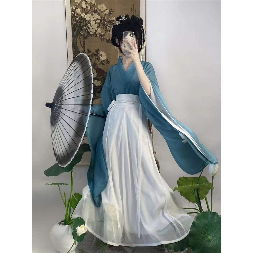 Tre-delat set med korshalsad midjelång kjolstil från Wei- och Jin-dynastierna för kvinnor