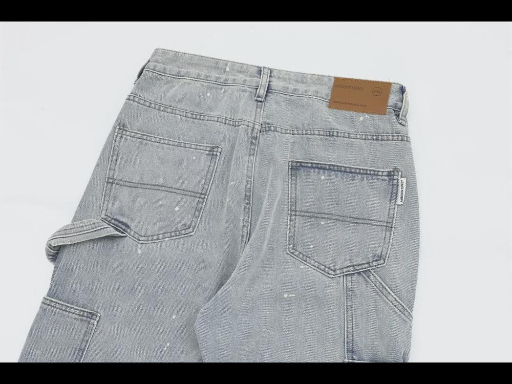 Trendy Herrenhose aus gewaschenem Denim mit geradem Bein und Kontrastnähten im Punk-Stil mit Tintenspritzern und Katzenschnurrhaar-Details