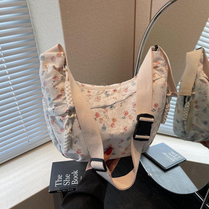 

Broken flower canvas bag women s new casual shoulder bag summer versatile commuter messenger dumpling bag