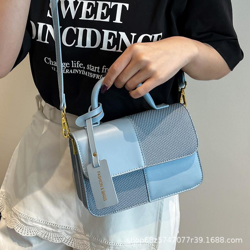 2025 new contrasting color retro portable small square bag female Sen Meng fashionable texture shoulder bag personalized commuter messenger bag