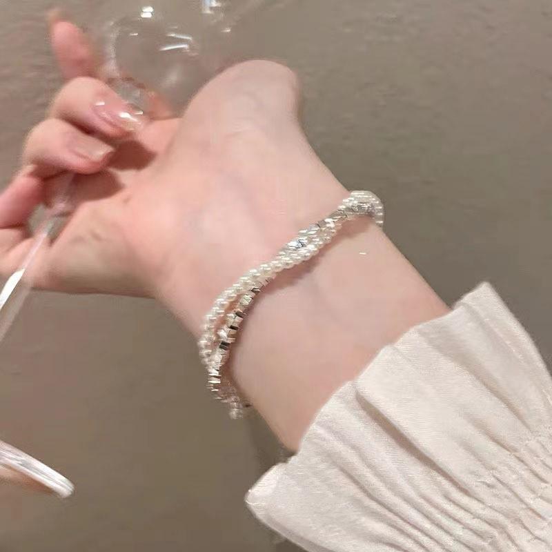 Pearl Womens Bracelet With Irregular Silver Beads And Tassel Accents For A Look Classy