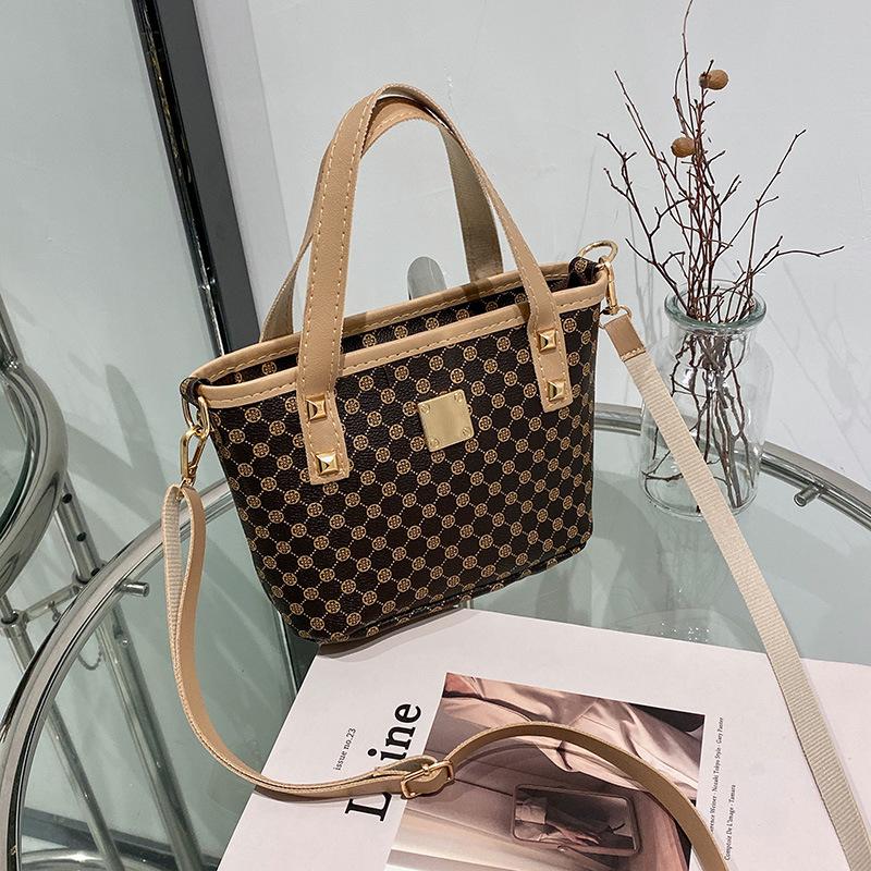 Women's bag, new spring and summer temperament, retro oblique span bucket bag, a portable underlay flower bucket