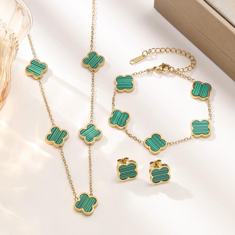 Titanium Steel Four-Leaf Clover Jewelry Set: Bracelet, Necklace & Earrings.