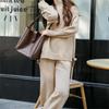 European and American autumn and winter knitted suit women's loose large-size split-ended sweater + straight wide-leg pants two-piece set