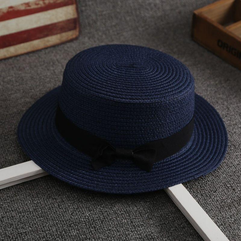 Flat top straw hat women's beach sunscreen bow top hat photo vacation straw weaving simple temperament sun hat