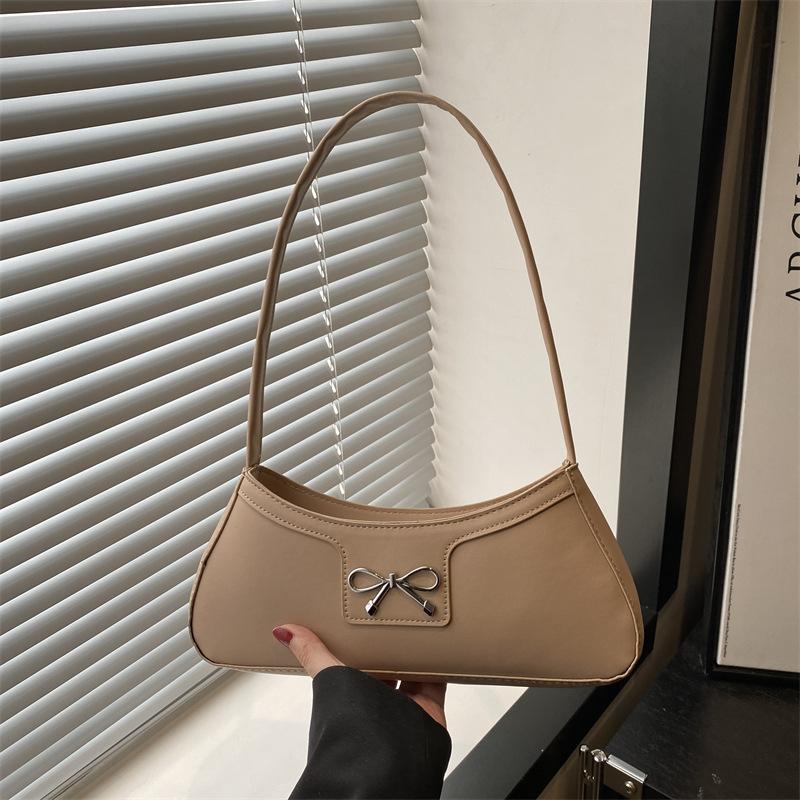 

Spring popular bow small bag women s 2025 new fashion underarm crescent bag texture versatile messenger bag