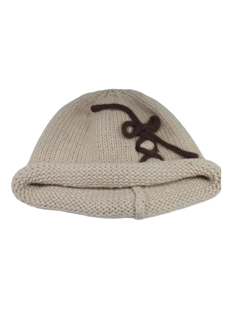 Literary bow decorative sleeve knitted hat thick needle crimped women's cold hat autumn and winter thickened wool hat
