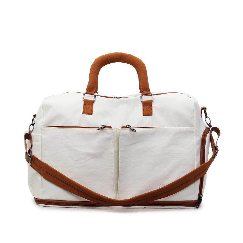 

Large-Capacity Multifunctional Travel Bag with Dry & Wet Separation, Suitcase Attachability, and Fitness Storage білий