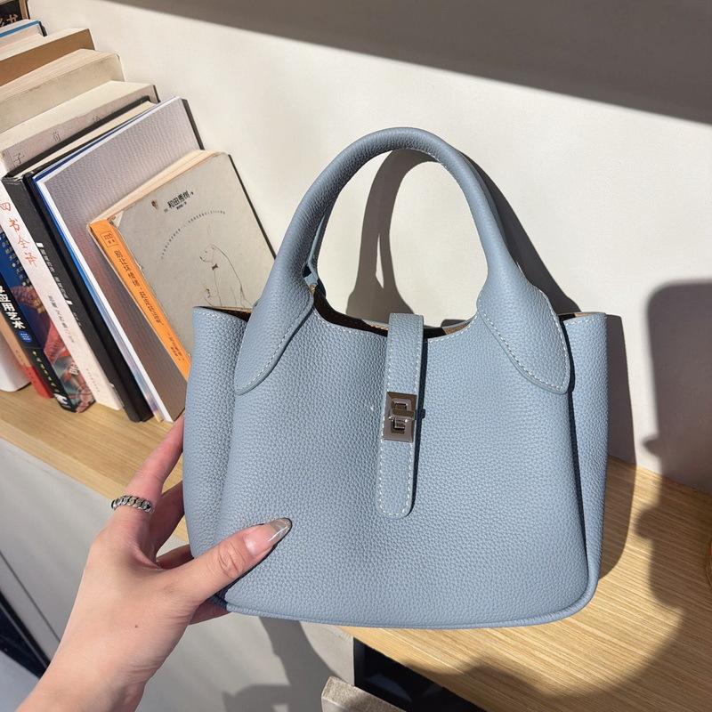 New Leather Women's Bag First Layer Cowhide Li Pattern Leather High-end Feeling Hand Carrying Bucket Bag Women's Lychee Pattern Basket Bag