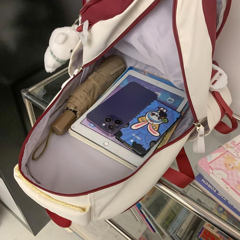 The schoolbag is high-value, fresh and cute, the schoolbag is casual, simple and light, and the commute is versatile and large capacity.