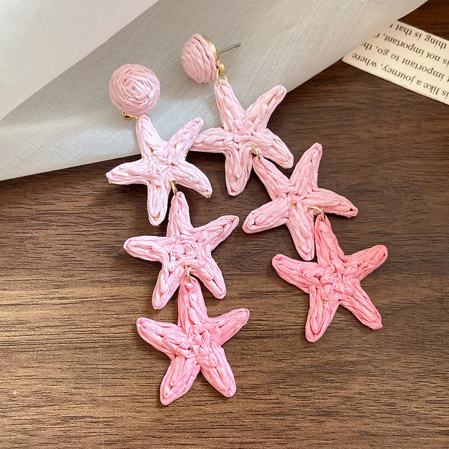 

Silver needle raffia star fringed earrings seaside vacation wind sweet small fresh earrings niche high-end earrings