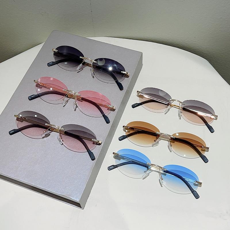 Small Oval Metal Thin Temples Ocean Lens Rimless Sunglasses Women Men Personalized Beach Vacation Sunshade UV400 Sunglasses