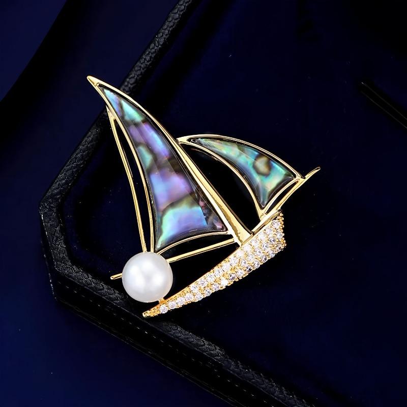 The "Smooth Sailing" Brooch Is A High-end Women's Design with A Unique and Exquisite Sailboat Corsage