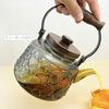 IwaiLoft "Betia Flower" Heat-Resistant Glass Teapot with Strainer, 1000ml, Handmade with Wooden Handle, Jumping Design, Perfect for Fruit Tea, Flower