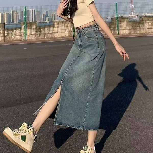 

Жіноча чорна джинсова спідниця А-силуету з високою талією та розрізом S