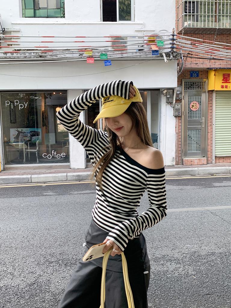 Black and white striped diagonal shoulder long-sleeved t-shirt women's spring chic beautiful spice girl style slim-fit one-word shoulder top