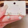 Fashion and elegance, atmospheric bow pearl earrings, women's design sense, versatile, exquisite stud earrings, sweet temperament, ear jewelry