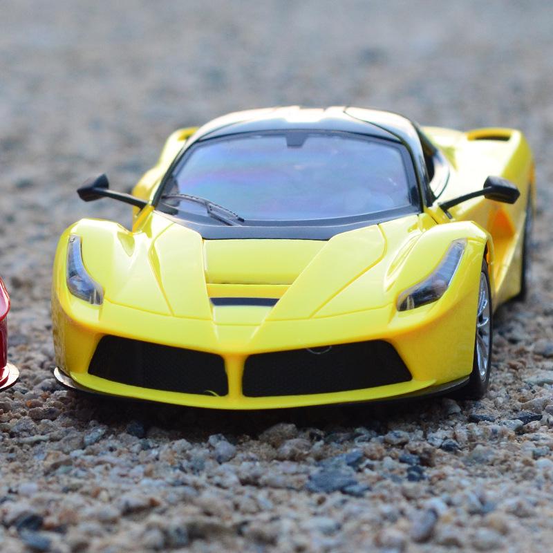

1:14 Ferrari Радиоуправляемая машина с датчиком гравитации, световыми эффектами и открытием дверей одной кнопкой для детей
