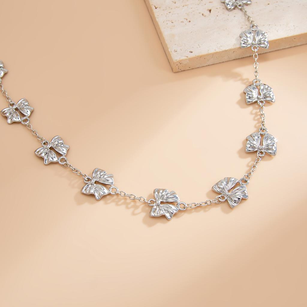 Temperament Fashion Bow Cross Necklace Simple Imitation Pearl Tassel Long Section Collarbone Chain