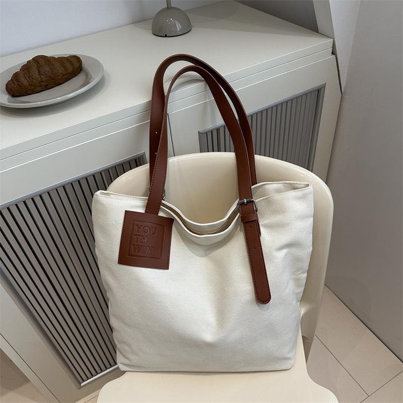 

Japan and South Korea ins sail cloth bag 2025 new simple contrasting color tote bag women s large-capacity shoulder bucket bag белый