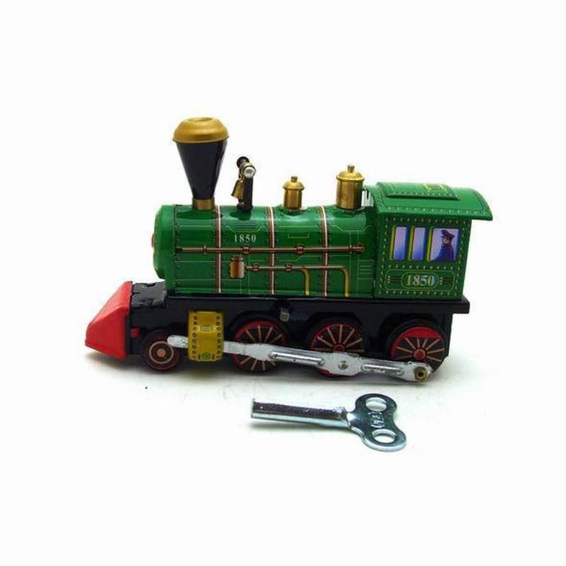 Зеленый локомотив заводная игрушка креативные подарки фотореквизит жестяные игрушки — фото 4