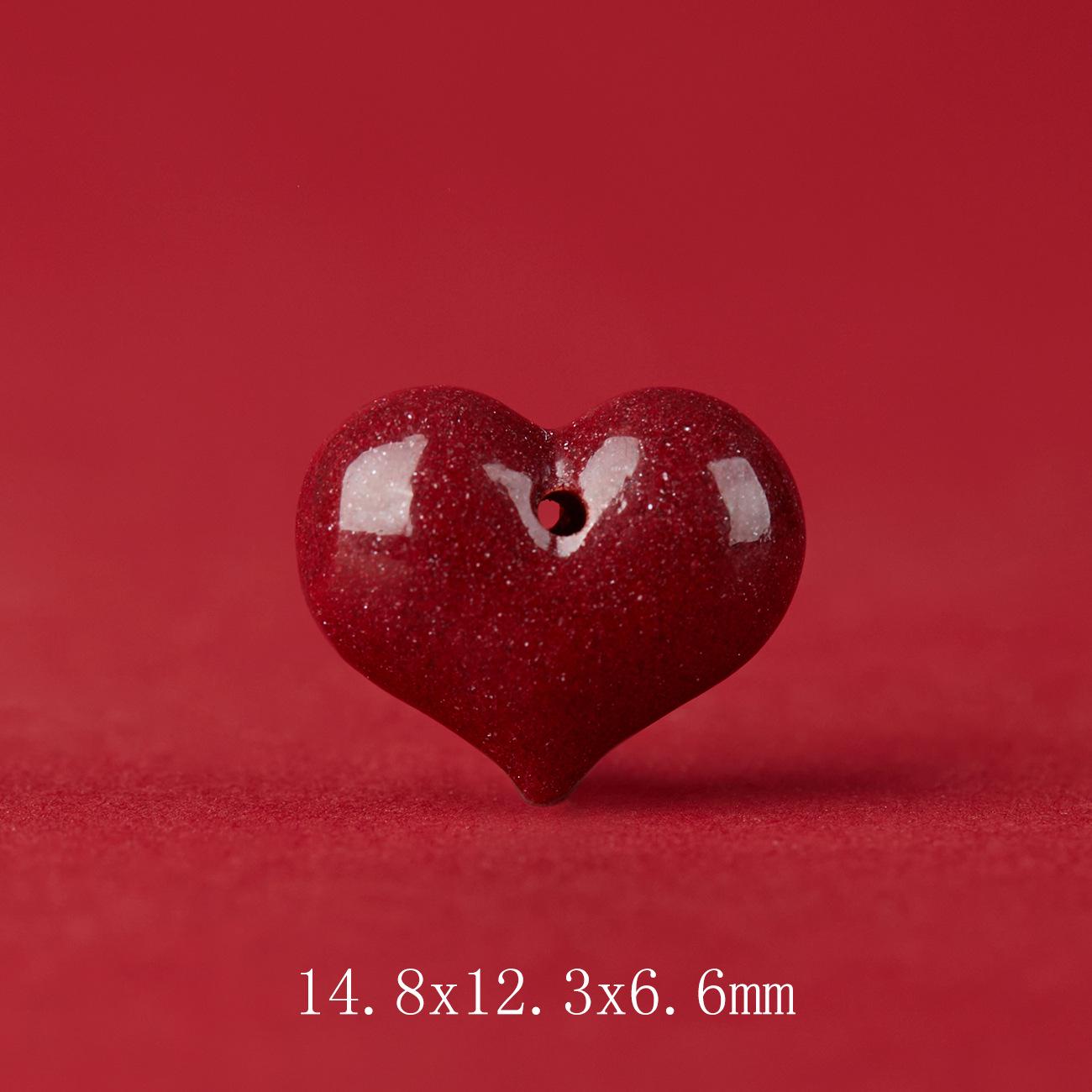 

Jingchunlan Heart-Shaped Cinnabar Purple Gold Sand Pendant Jewelry 97% Purple Gold Sand