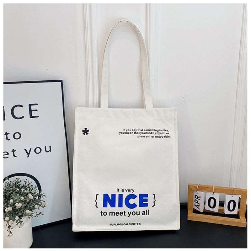 

Fashion tote bag New female college student make-up bag Canvas bag Daily commuter bag Large capacity armpit bag