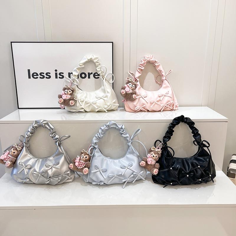 Niche pleated bow dumpling bag women's 2026 spring new Korean light luxury texture shoulder armpit bag