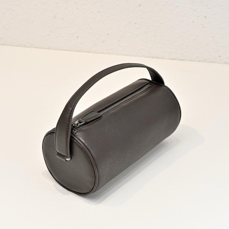 

Niche new S pencil bag, sheepskin niche hand bag, women s simple fashion cylinder bag 19.5*9.5*9cm шоколад коричневого кольору