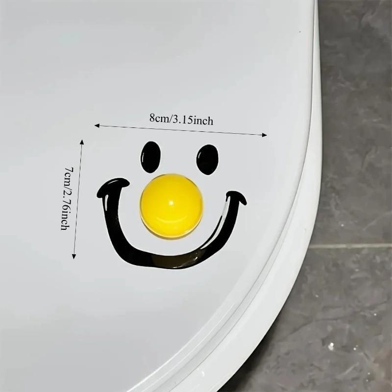 Současný styl Dopamin Smile Ball Zvedač víka toalety, kulatý tvar, ruční otvírač krytu záchodového sedátka do koupelny