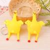 Squeeze Egg Laying Chicken Prank Keychain - Goofy Stress Relief Toy