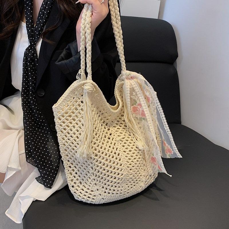 Casual large-capacity woven bag New hollow lazy wind shoulder bag Casual beach bag Women's bag