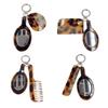 Fashionable Keyring Multifunctional Leopard Comb and Mirror Keychain for Stylish Hair Care Creative Key Ring Bag Pendant
